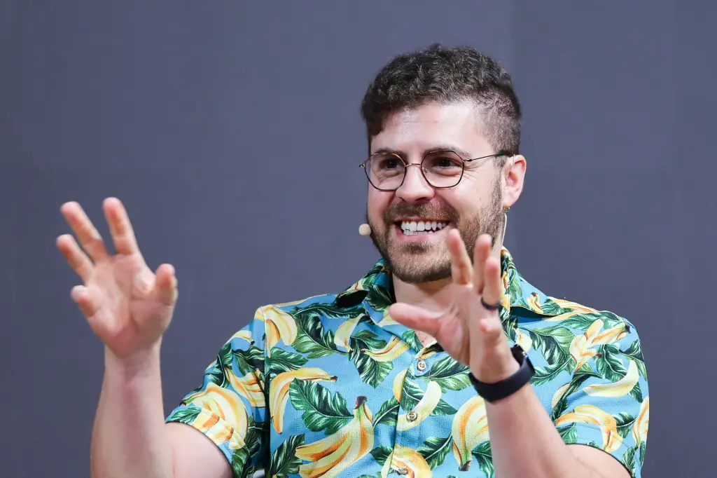 Anthropic co-founder Benjamin Mann speaks on stage