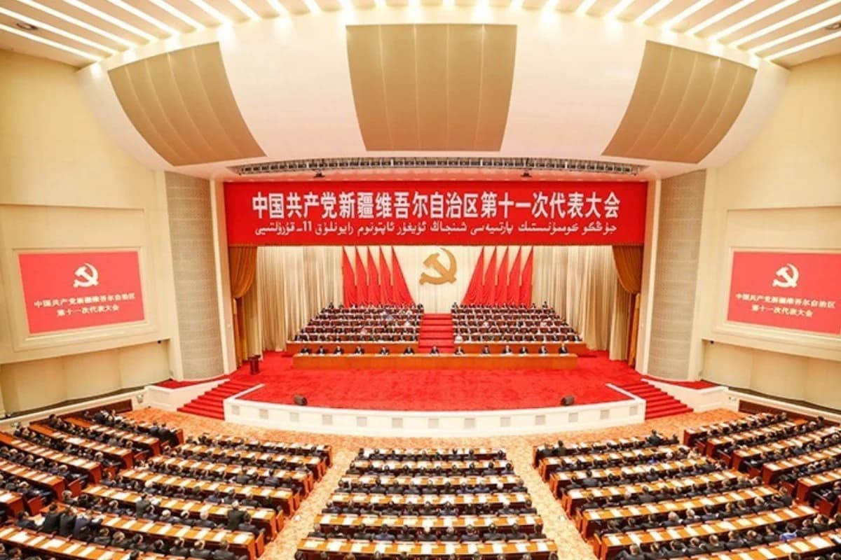 Delegates fill a hall decorated with Communist Party banners during a regional party congress in China