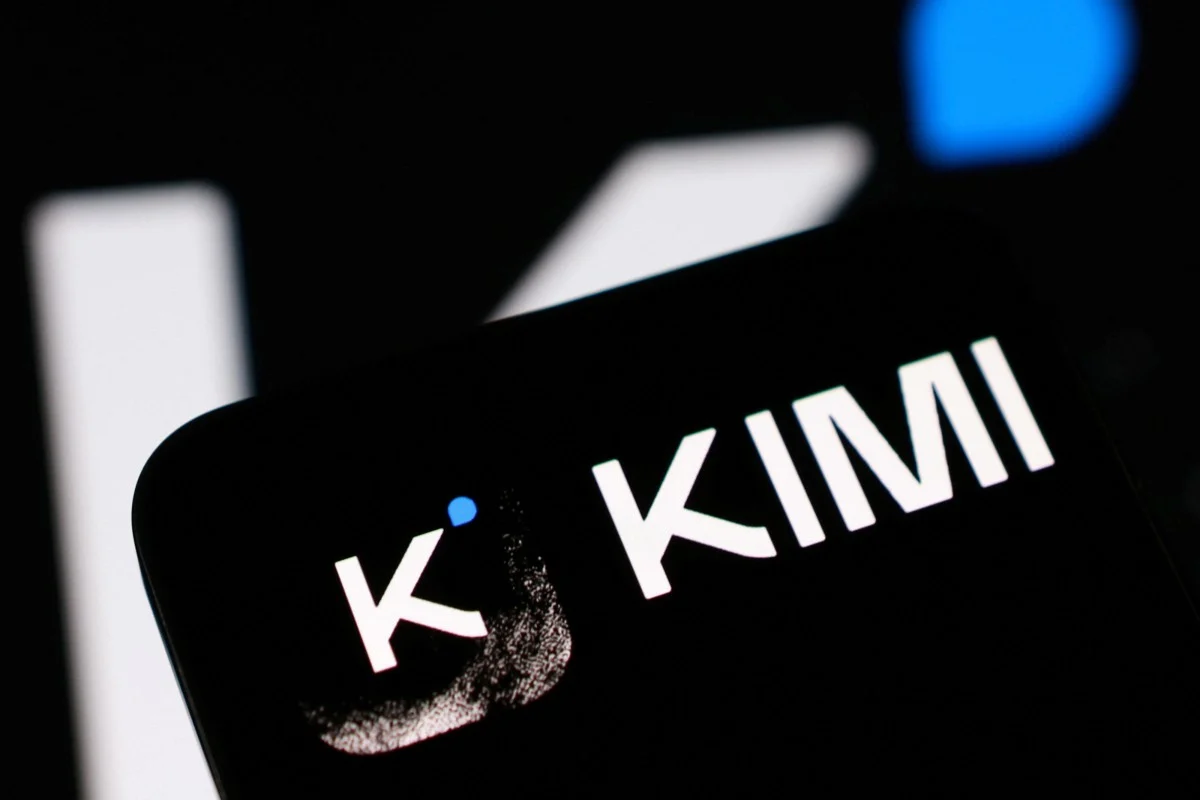A smartphone displays the Kimi AI chatbot branding